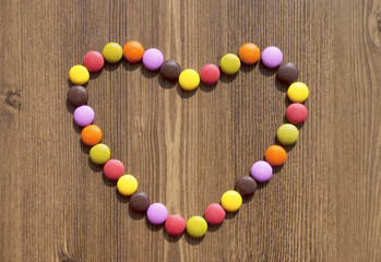 Heart made of colorful candies for bacgrounds