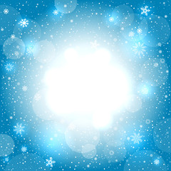 Fototapeta na wymiar glowing snow circle blue bokeh