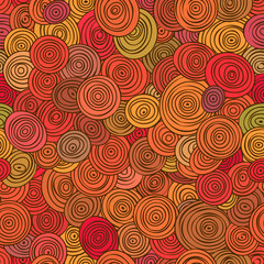 Seamless abstract red pattern of striped circles in circles.