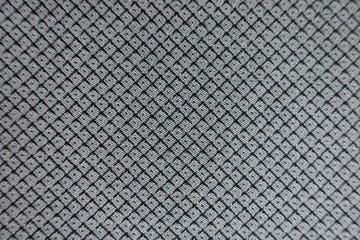 Symmetric pattern on grey viscose fabric from above