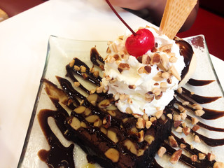 Brownie with ice cream on the dish