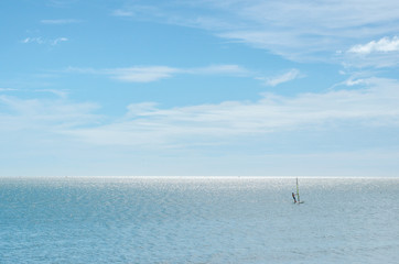 Fototapeta premium Landscape of the sea with Windsurfer.