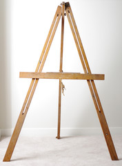 Painting easel empty against white background