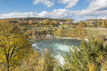 Fototapeta na wymiar Rheinfall in Autumn, the biggest waterfall in Europe