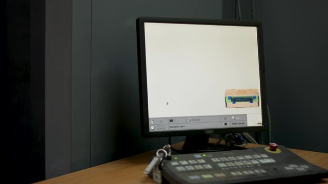 X-ray screenshot in the airport on the safety control. Airport security check scan machine with metal detector X ray