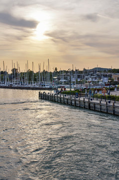 Sunset in harbor with yachts