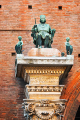 Ferrara, Italy - 09.06.2017. Historic monument on the facade of the house in the city center