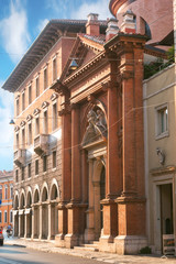 Fototapeta na wymiar Ferrara, Italy - 07.06.2017.View on Via Corso della Giovecca, Facade of houses, ancient architecture