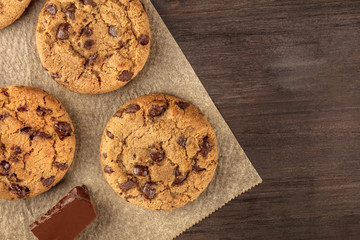 Chocolate chips cookies on baking paper with copyspace