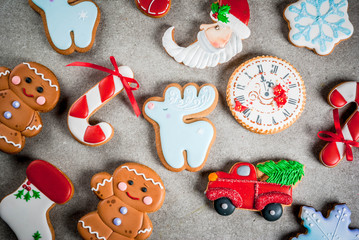 Christmas background wit selection of homemade colorful gingerbread cookies. Top view, copy space