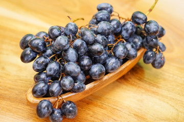 Grapes on wood table