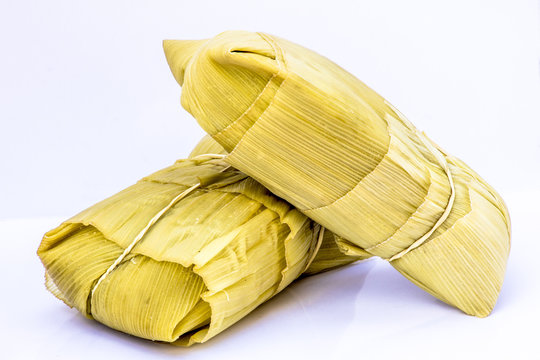 Pamonha. Brazilian Corn Snack on white background