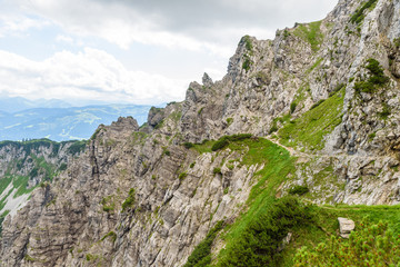 Iron stairs and hiking path to Ellmauer Halt at Wilder Kaiser mountains of Austria - close to Gruttenhuette, Going, Tyrol, Austria - Hiking in the Alps of Europe