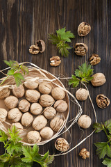 Walnuts on a vintage wooden background. Top view, background