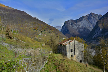 Fototapeta na wymiar The autumn landscape around the small hill village of Erto in Friuli Venezia Giulia, north east Italy. 