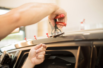 Repairing dents in a car - obrazy, fototapety, plakaty