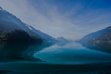 Lake Brienz Interlaken, Switzerland with backgound of Alps mountain and crystal clear emerald color of water