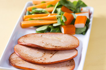 Fillets turkey with salad