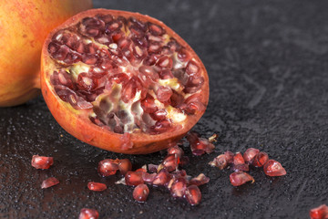 Pomegranate in a black background