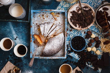 Almond tart chocolate coffee overhead composition break spread table 