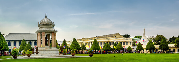 Tourists visit the Grand Palace in Bangkok, Thailand. Grand Palace is the most famous temple and...