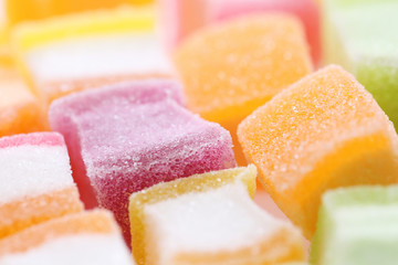 Colorful cube jelly candy isolated in white background