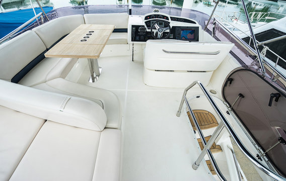 Interior of luxury modern yacht with driving place.