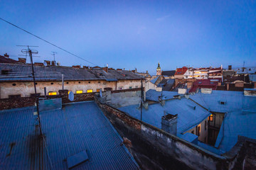Fototapeta na wymiar Late evening view from the roof of building on the Old Town of Lviv, Ukraine