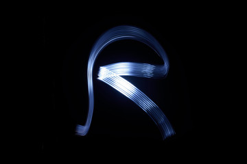 paint with light on black background letter R