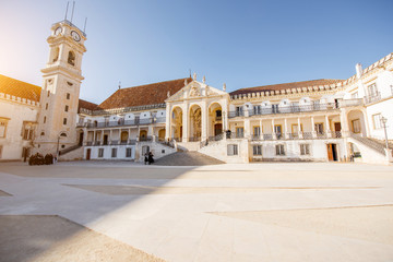 View on the courtyard of the old university with university tower in Coimbra city during the sunset in the central Portugal