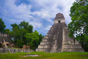 Fototapeta na wymiar A pyramid in Tikal area with ruins from the Mayan era in Guatemala.