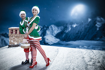 Christmas elf. Roof with chimney. Mountain view with snow and moon. December night. Christmas Eve.