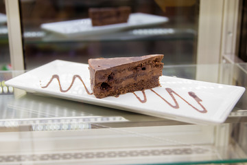cake truffle with black chocolate sauce