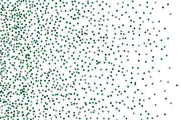 Background with Green glitter, confetti. Randomly, chaotic polka dots, circles, round small-scale Festive design. 