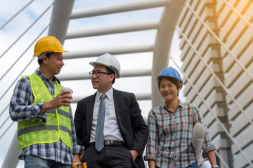 engineering construction concept : professional engineer team meeting foreman group plan manufacturing industry