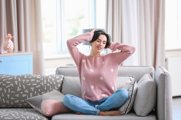 Obraz premium Attractive young woman in casual clothes at home