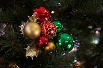 a bouquet of gold red and green Christmas decorations