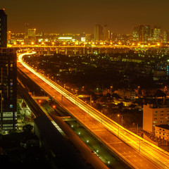 Transportation in modern city, Street night light, light trails at night on motorway, urban view at night time