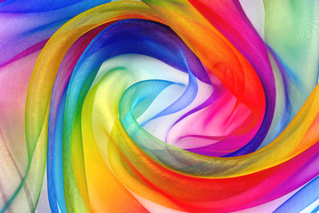 twisted twirl of organza fabric multicolour texture - obrazy, fototapety, plakaty