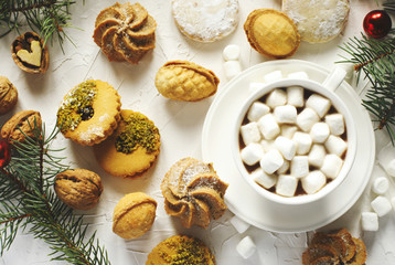 Cup of ho chocolate and assorted cookies: linzer cookies,shortbread, nuts cookie, orange almond cookie.