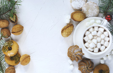 Cup of hot chocolate and assorted cookies: linzer cookies,shortbread, nuts cookie, orange almond cookie.