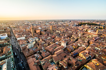 Aerial view of Bologna, Italy at sunset. Colorful sky over the historical city center and old buildings