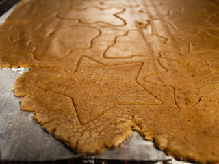 The recipe for making ginger biscuits. cut cookie dough.