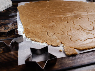 The recipe for making ginger biscuits. cut cookie dough.
