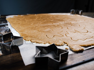 The recipe for making ginger biscuits. cut cookie dough.