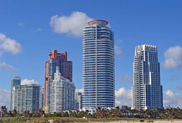 Fototapeta na wymiar Luxury condo towers over looking the beach at Southpointe Park on Miami Beach,Florida