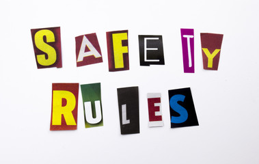 A word writing text showing concept of Safety Rules made of different magazine newspaper letter for Business case on the white background with copy space