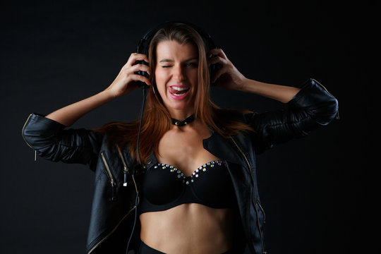 Picture of cheerful model in headphones and underwear