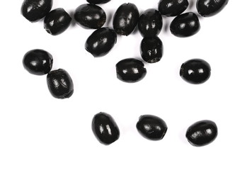 Black olives isolated on white background, top view