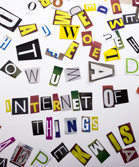 A word writing text showing concept of Internet Of Things made of different magazine newspaper letter for Business case on the white background with copy space